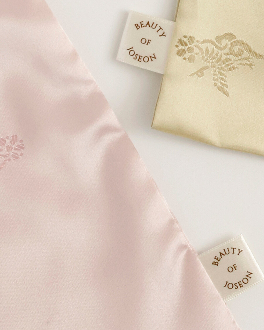 silk lucky pouch - elegant storage for skincare minis more
