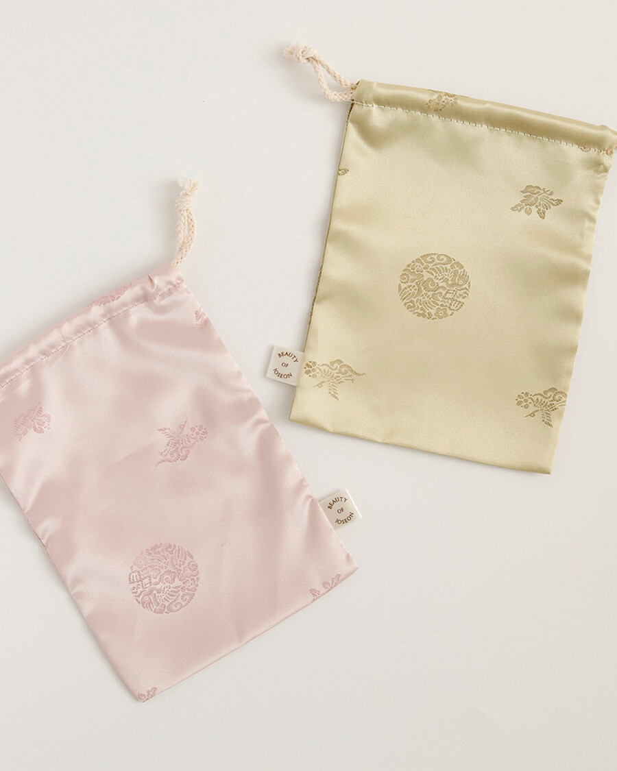 silk lucky pouch - elegant storage for skincare minis more